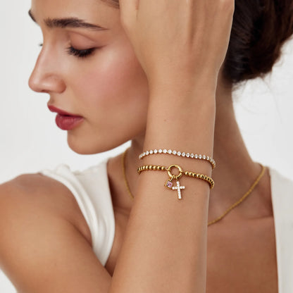 Perlenarmband mit Kreuz und Geburtsstein