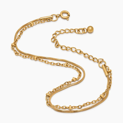 Geschichtetes Armband mit Perlen und Schlangenkette