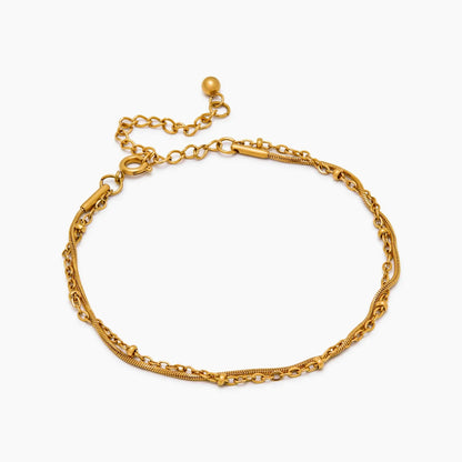 Geschichtetes Armband mit Perlen und Schlangenkette