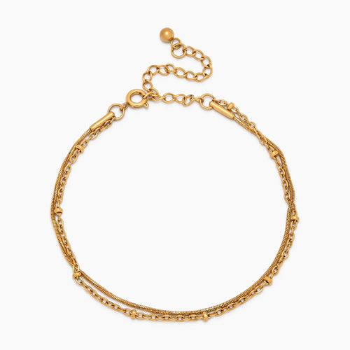 Geschichtetes Armband mit Perlen und Schlangenkette