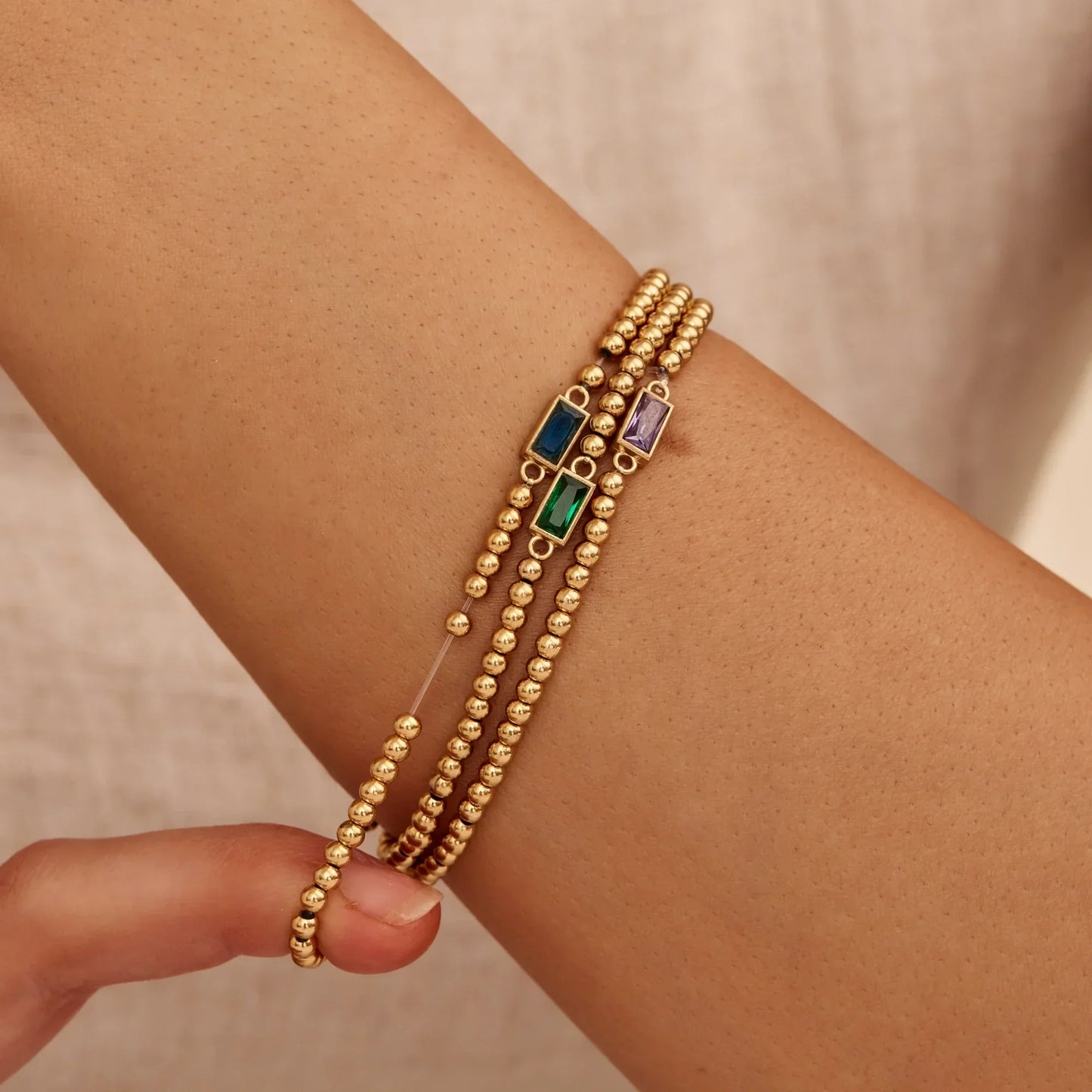 Goldenes Perlenarmband mit Geburtsstein