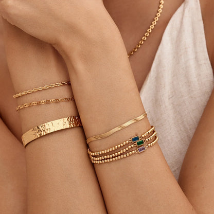 Goldenes Perlenarmband mit Geburtsstein