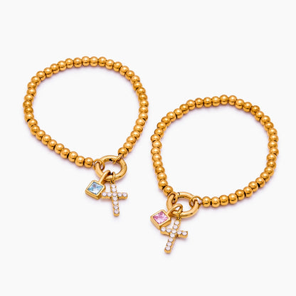 Perlenarmband mit Kreuz und Geburtsstein